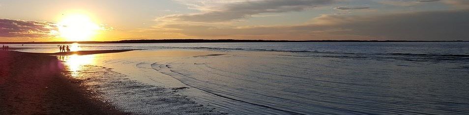 sunset over beach in moncton new brunswick